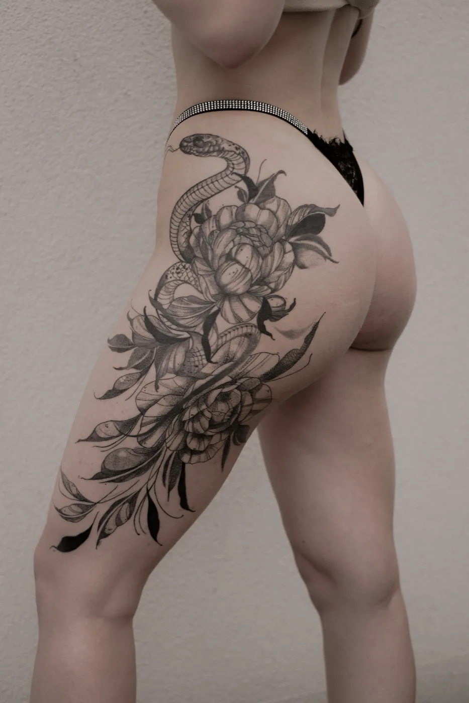Snake coiled in peonies — hip piece